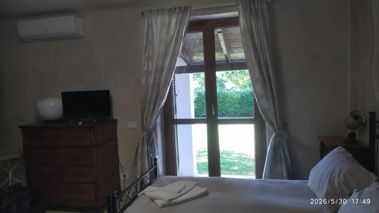 Letto o letti in una camera di Nostra Signora Del Lago