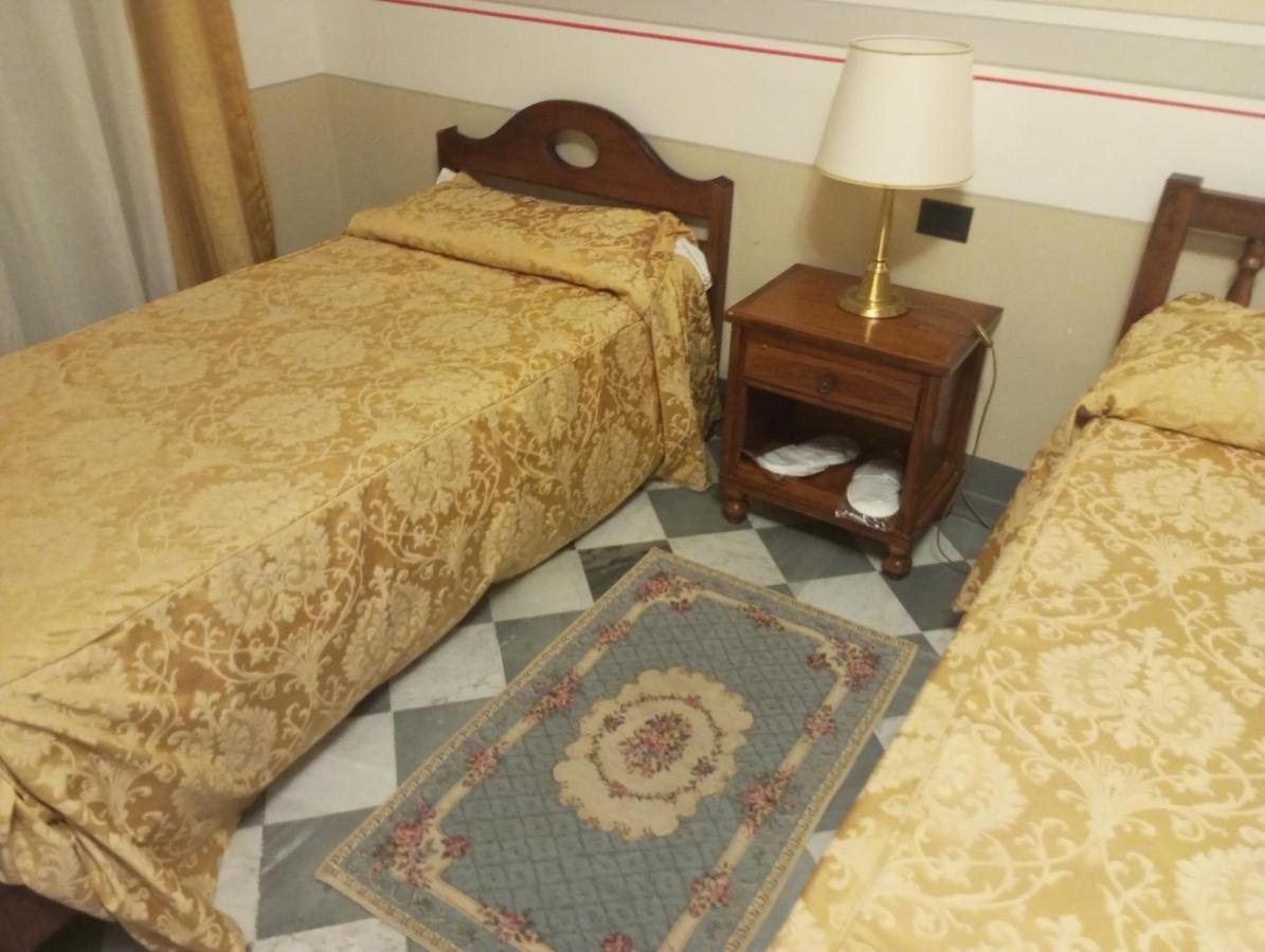 Letto o letti in una camera di Park Hotel Regina - with air-condition and outdoor heated pool