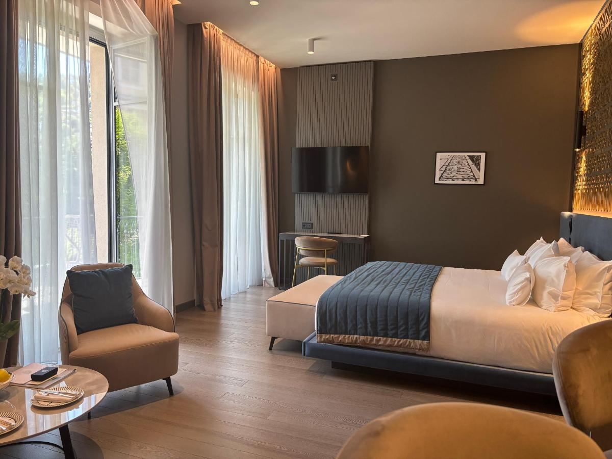 Letto o letti in una camera di Boutique Hotel Stresa