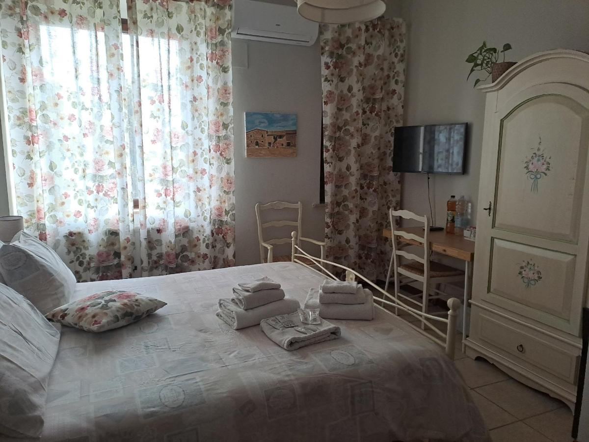 Letto o letti in una camera di Agriturismo con cucina Il Favaio