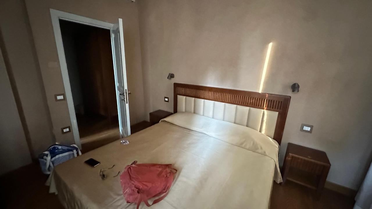 Letto o letti in una camera di Villa Mariotti