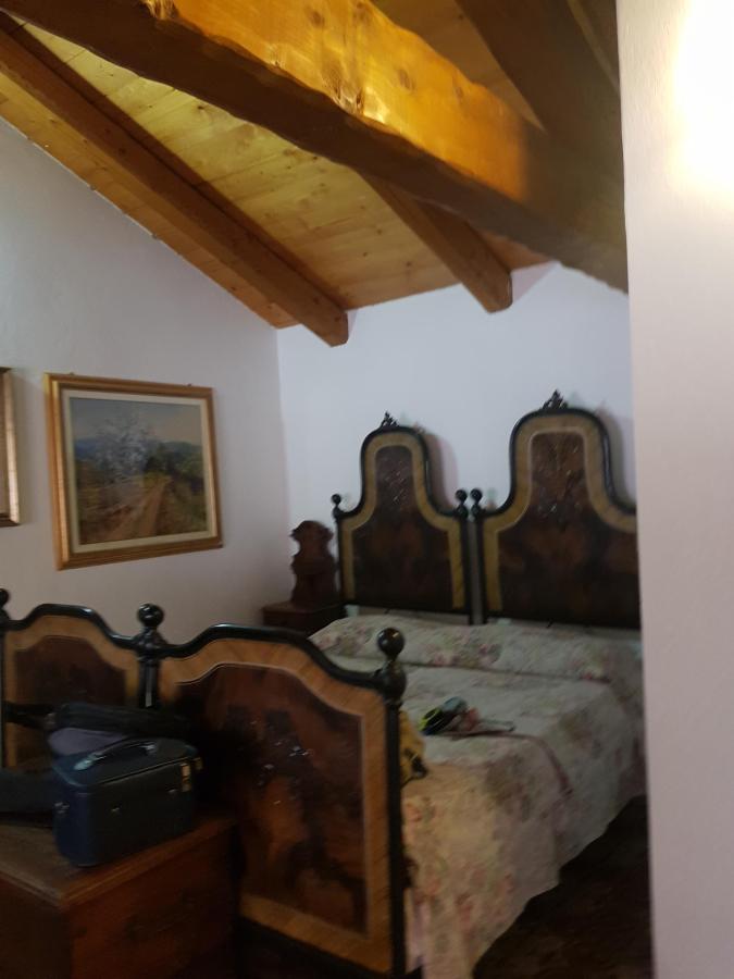 Letto o letti in una camera di La Corte Di Gerardo