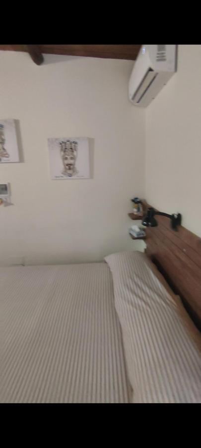 Letto o letti in una camera di Filuvespri