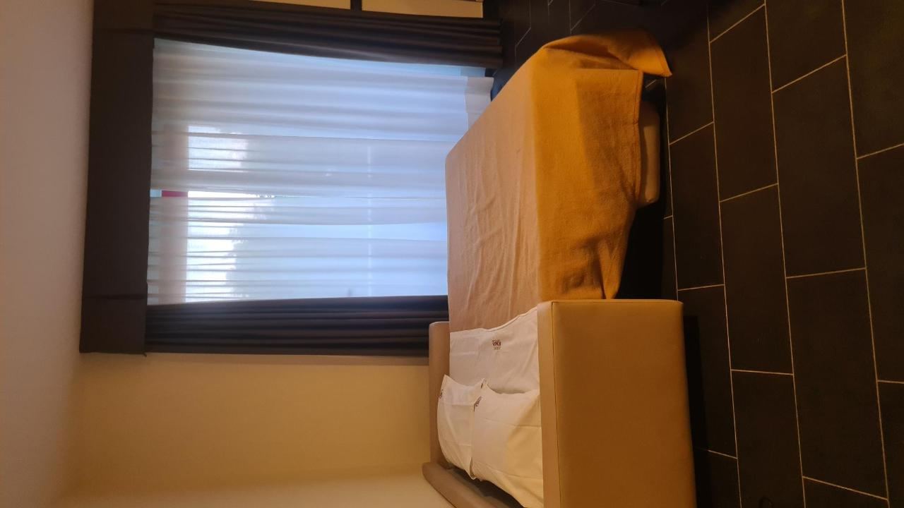 Letto o letti in una camera di Residence Roman