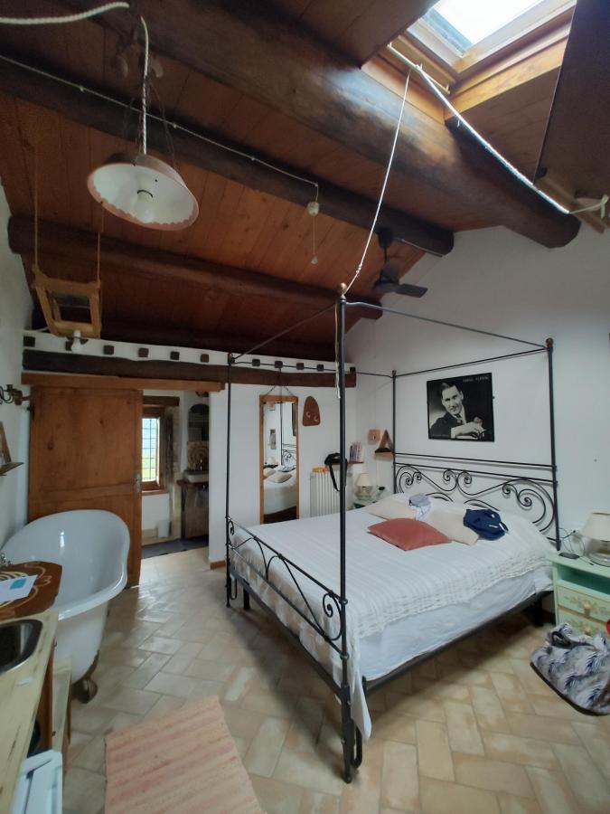 Letto o letti in una camera di Monte Paradiso Agriturismo