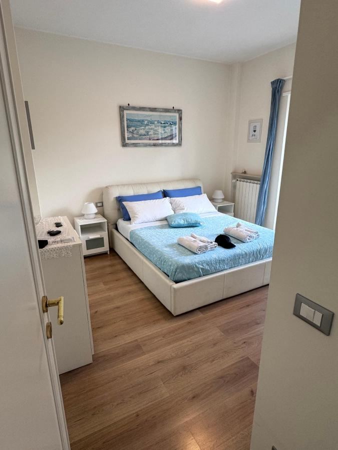 Letto o letti in una camera di Momentoroma b&b