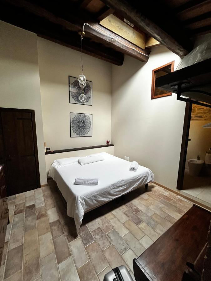 Letto o letti in una camera di Agriturismo Marcofrate, a Retreat in the Nature