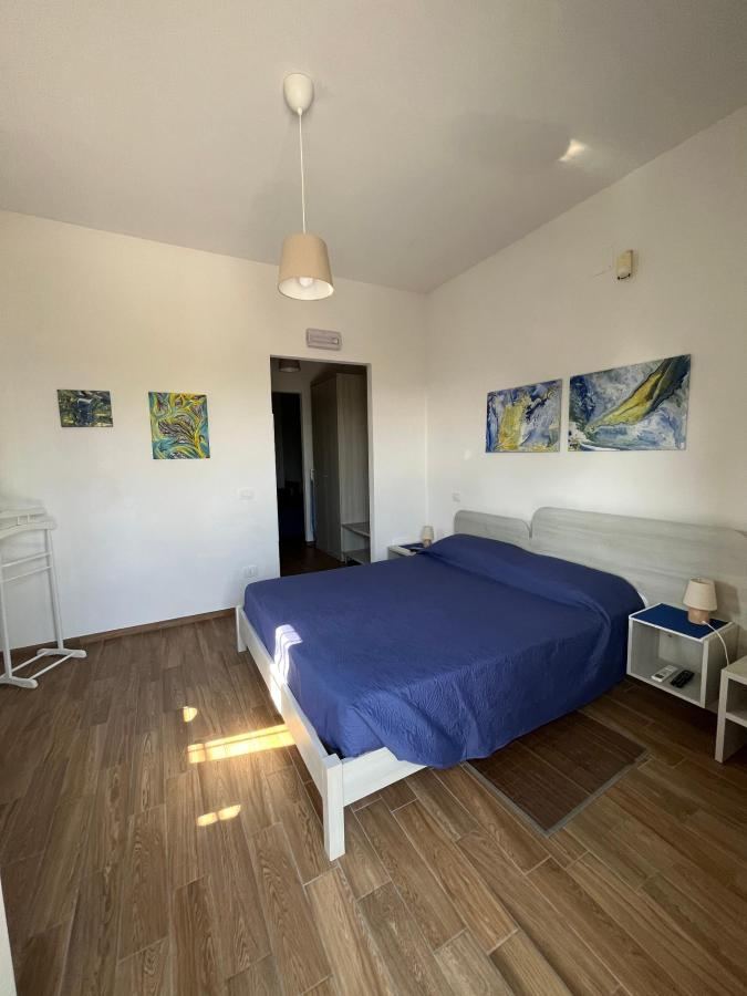 Letto o letti in una camera di Verdemare