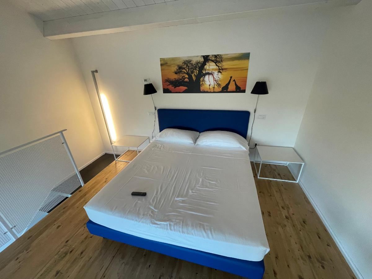 Letto o letti in una camera di Il Portico